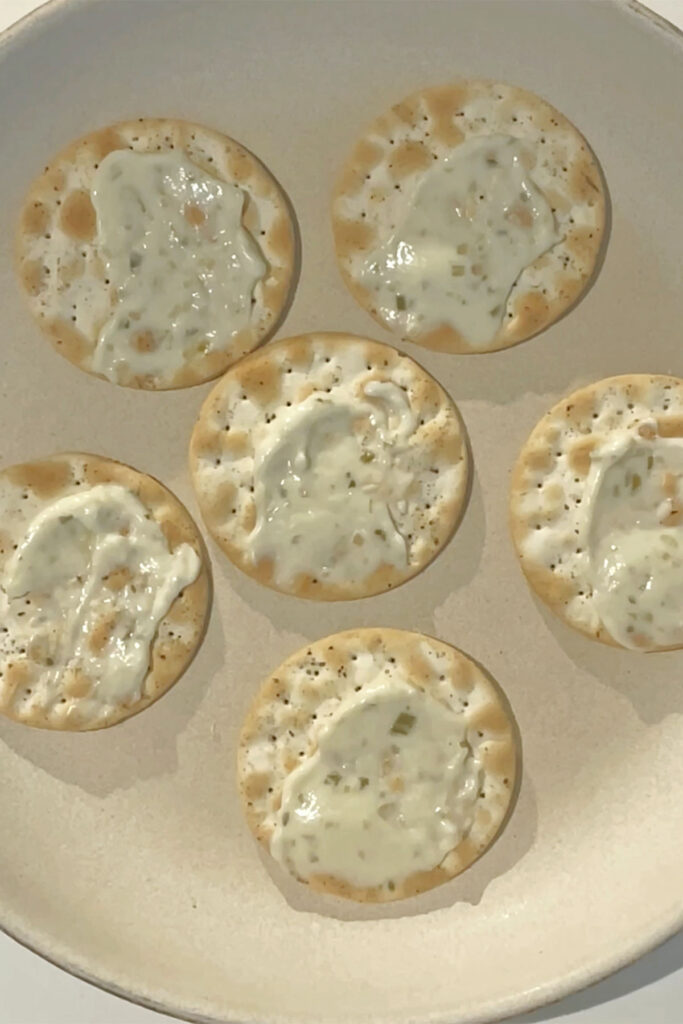 cracker with garlic cream cheese